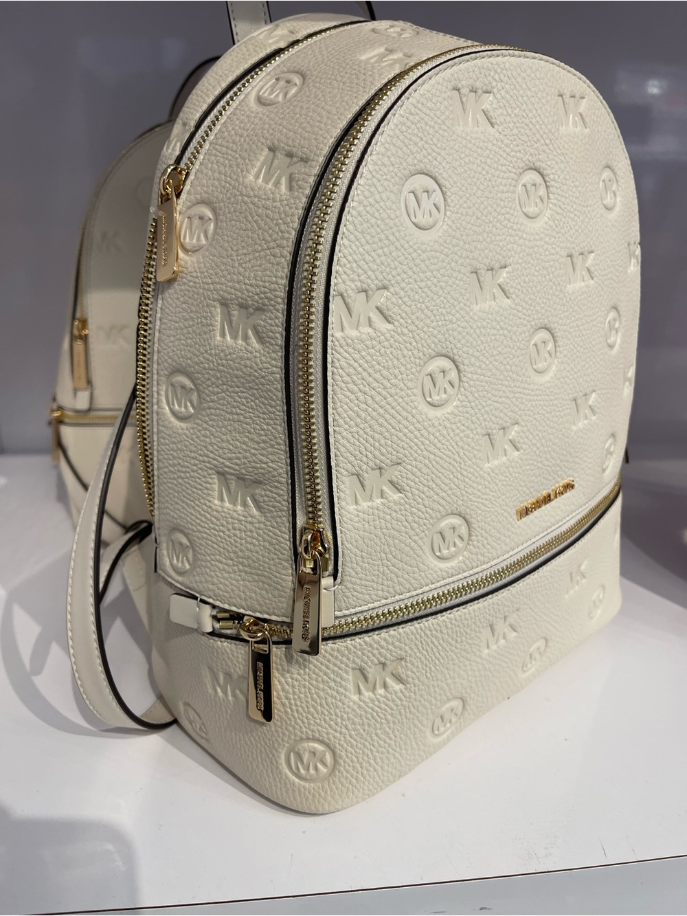 Michael Kors Rhea Medium Zip MK Logo Debossed Backpack
Light Cream 
NWT
